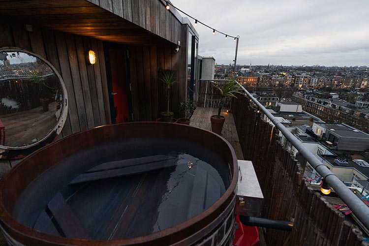 Volkshotel hot tub with a view