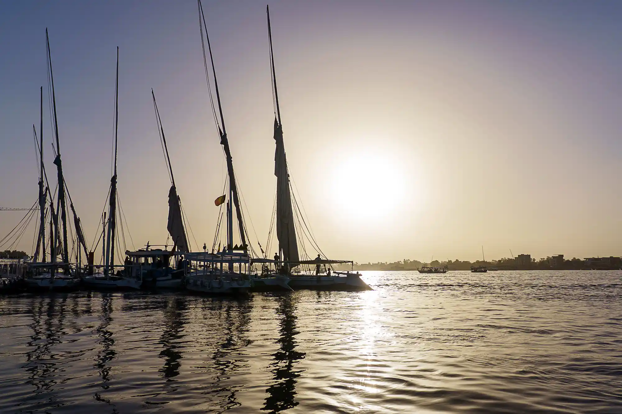 Boats gathered on the Nile at dusk