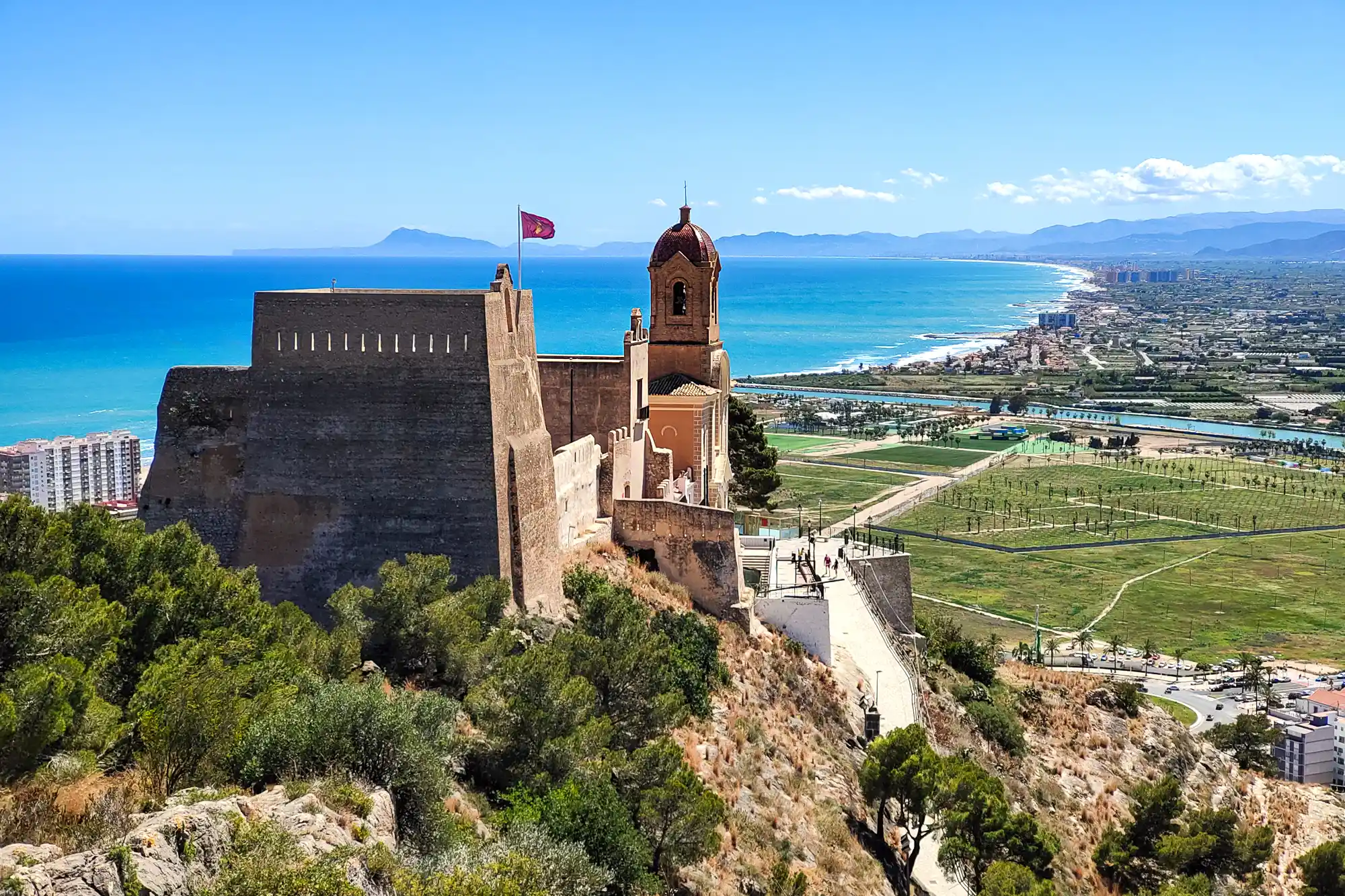 Cullera Castle with coastline and mountains in the background