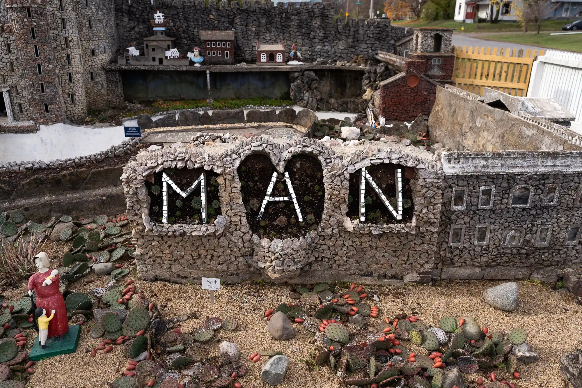 Man rock sign