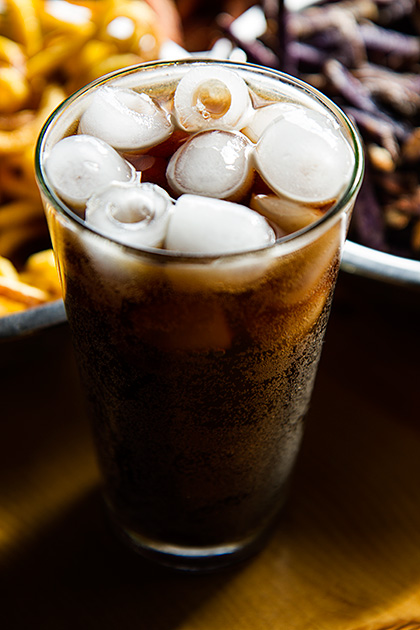 The Boise Fry Company 12 Soda with ice in a glass