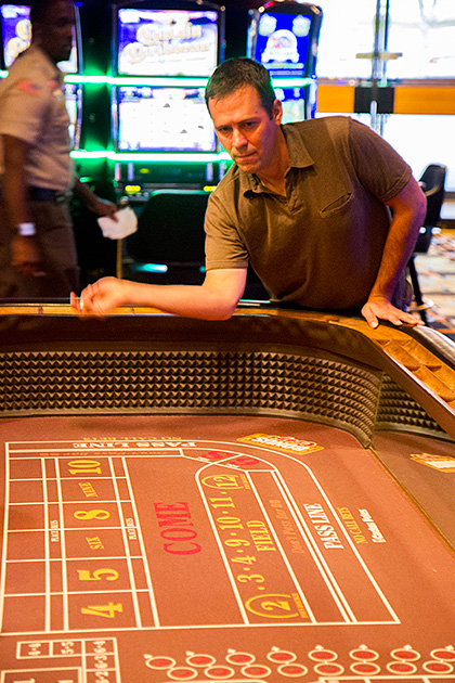 Vegas Flair at Cactus Petes in Jackpot, Nevada 4 Man playing crabs inside casino at a table