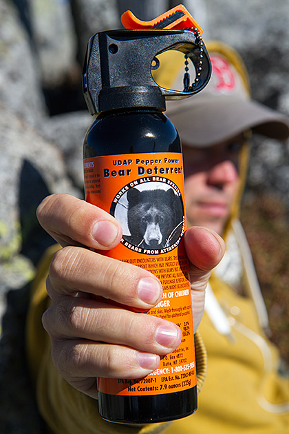 Grizzly Patrol Hikes to Hidden Lake 2 Man holding bear spray