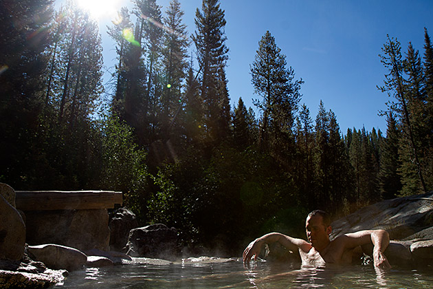 Hot man in hot spring in Idaho