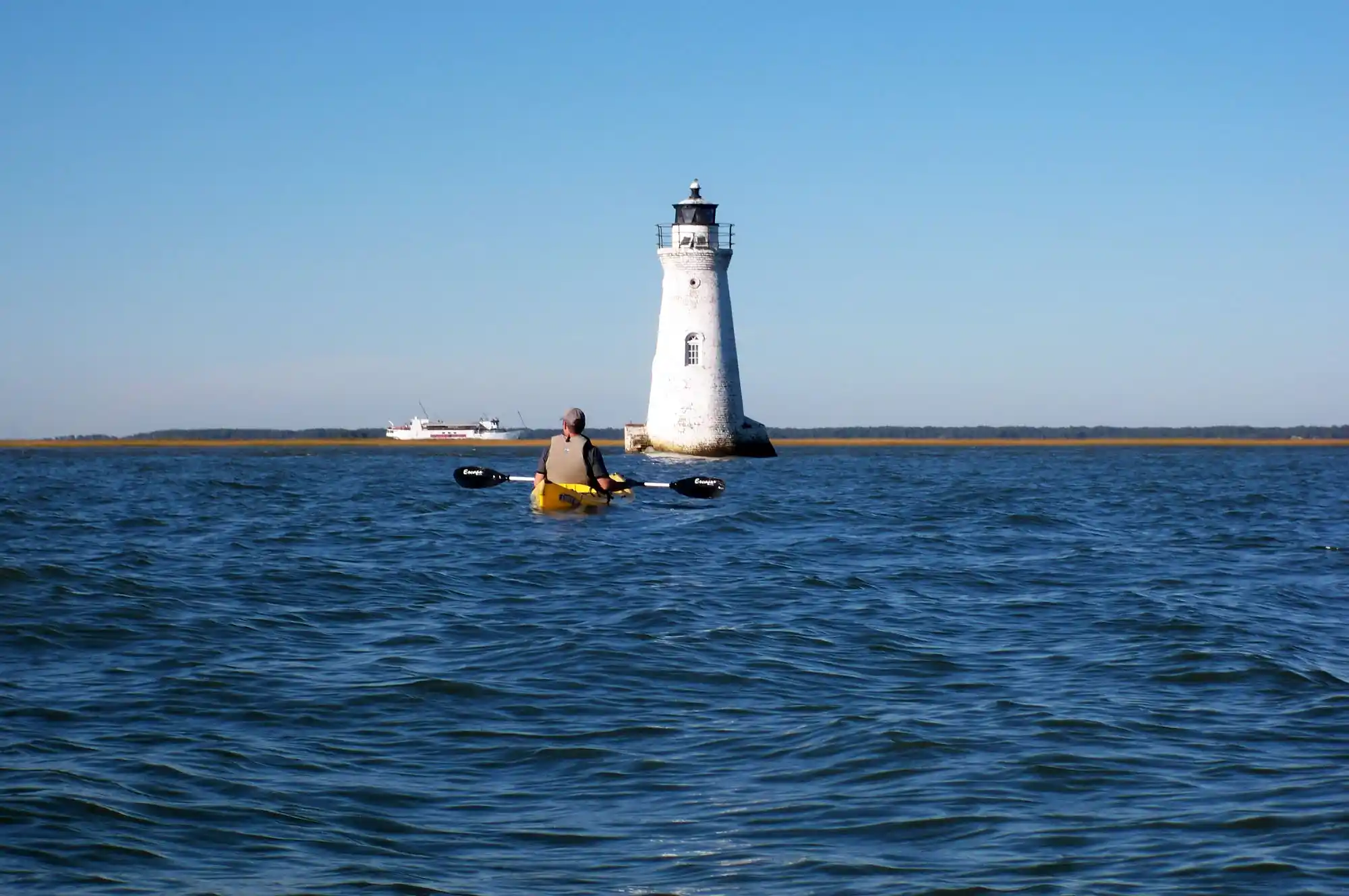 Kayaking on Tybee with lighthouse