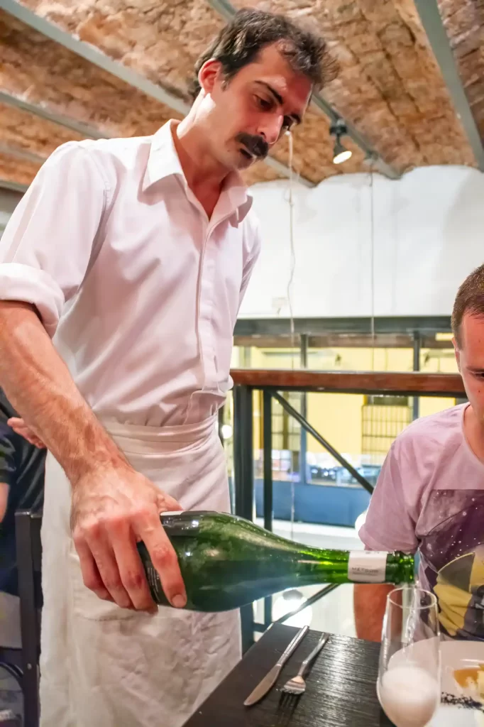 Man pouring wine in Buenos Aires